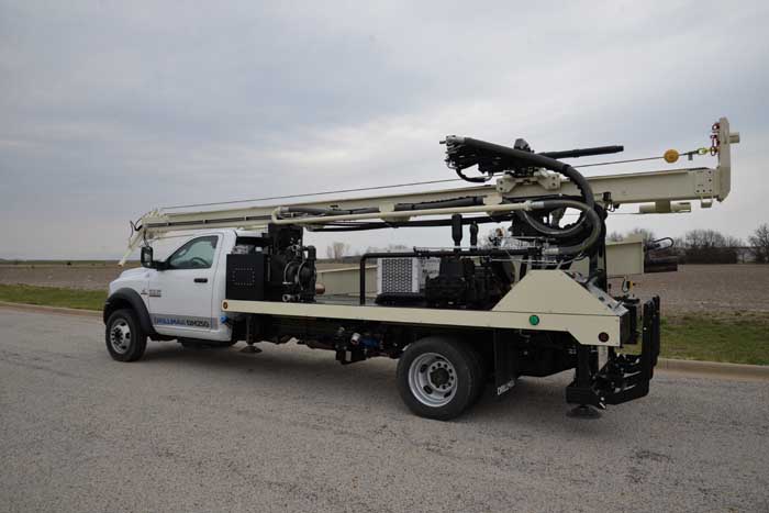The DRILLMAX® DM250 by Geoprobe® is easy to mobilize.  The Dodge 5500 chassis (pictured) is equipped with Cummins diesel engine, automatic transmission and 4x4.  The compact transport size makes the DM250 a good fit for residential work where limited access is a priority.