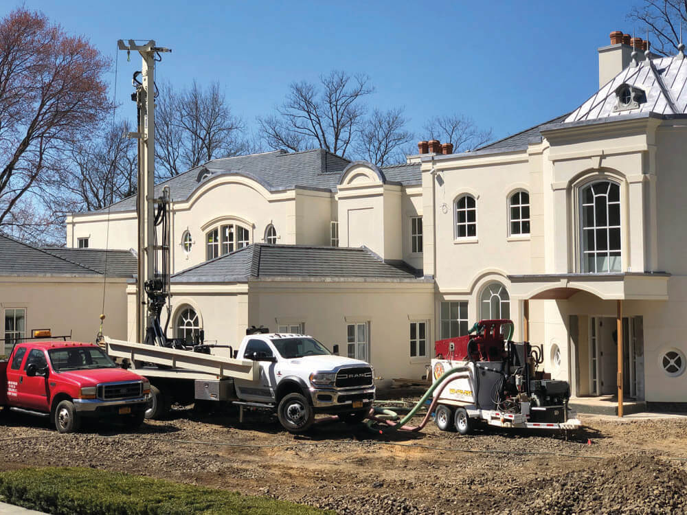 At a limited-access residential site in New York, the DM250 efficiently completes 15 bores to 305 feet through tough, plastic clay 80 percent of the hole to install geothermal field at a large residence.
