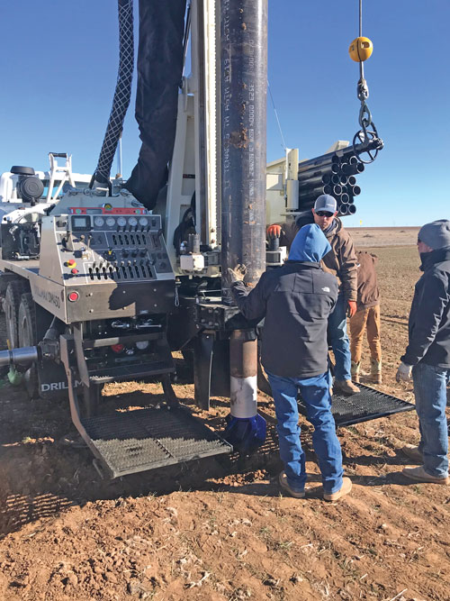 Engineer Joel Christy provides on-site training to Rhoads Farms' drilling crew.