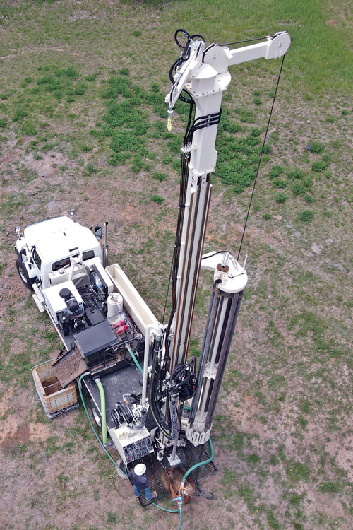 Sturdy drillmast on DM450 water well rig provides power needed for tough water well drilling, geothermal drilling, and cathodic protection drilling with jibs to access both sides of the drill rig.
