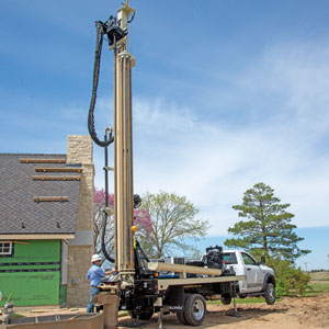 DM250 small drill rig production stands up to commercial geothermal drilling.